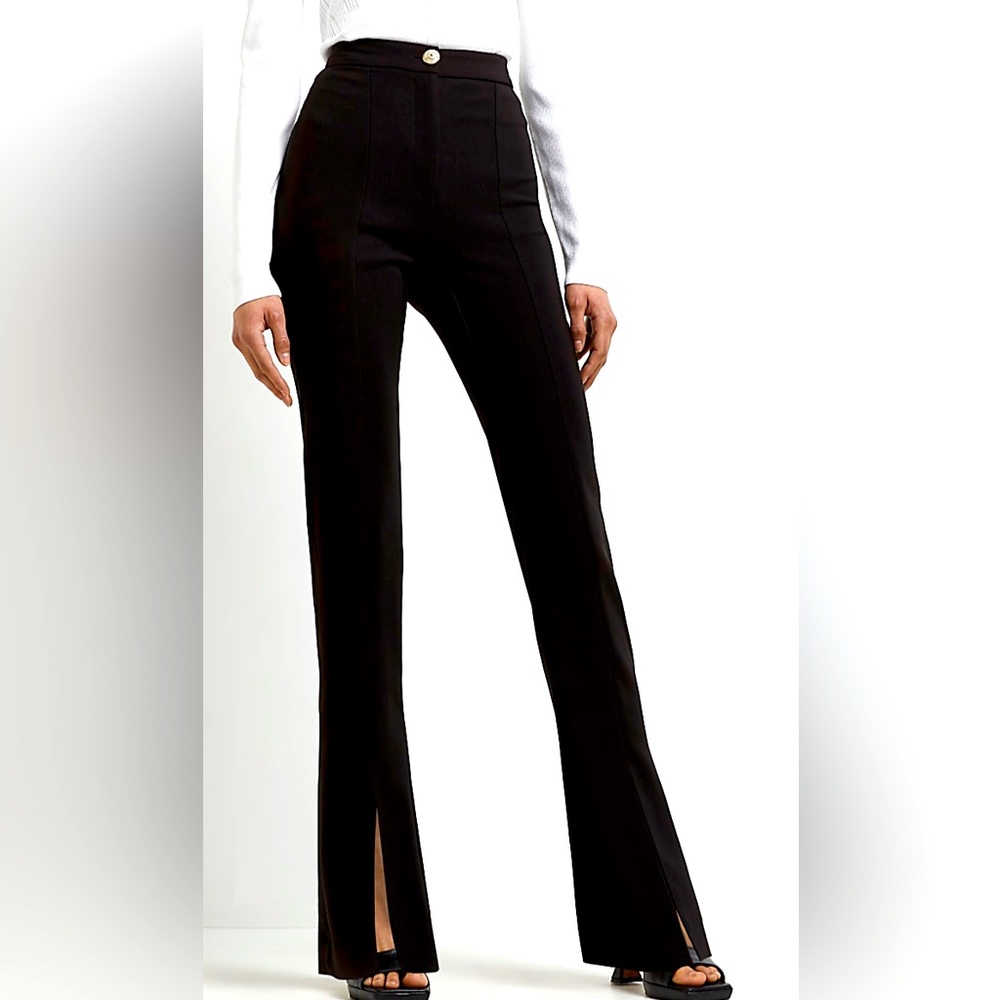 River Island US size 4. Never worn, no tags.